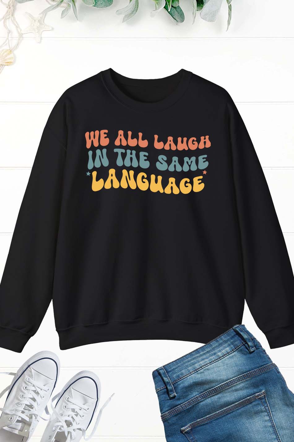 We All Laugh In The Same Language Sweatshirt